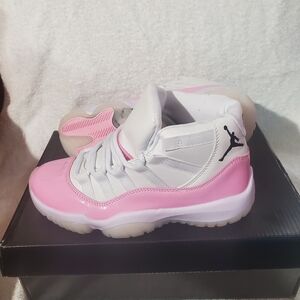 Jordan Pink and White Women’s Athletic Shoes